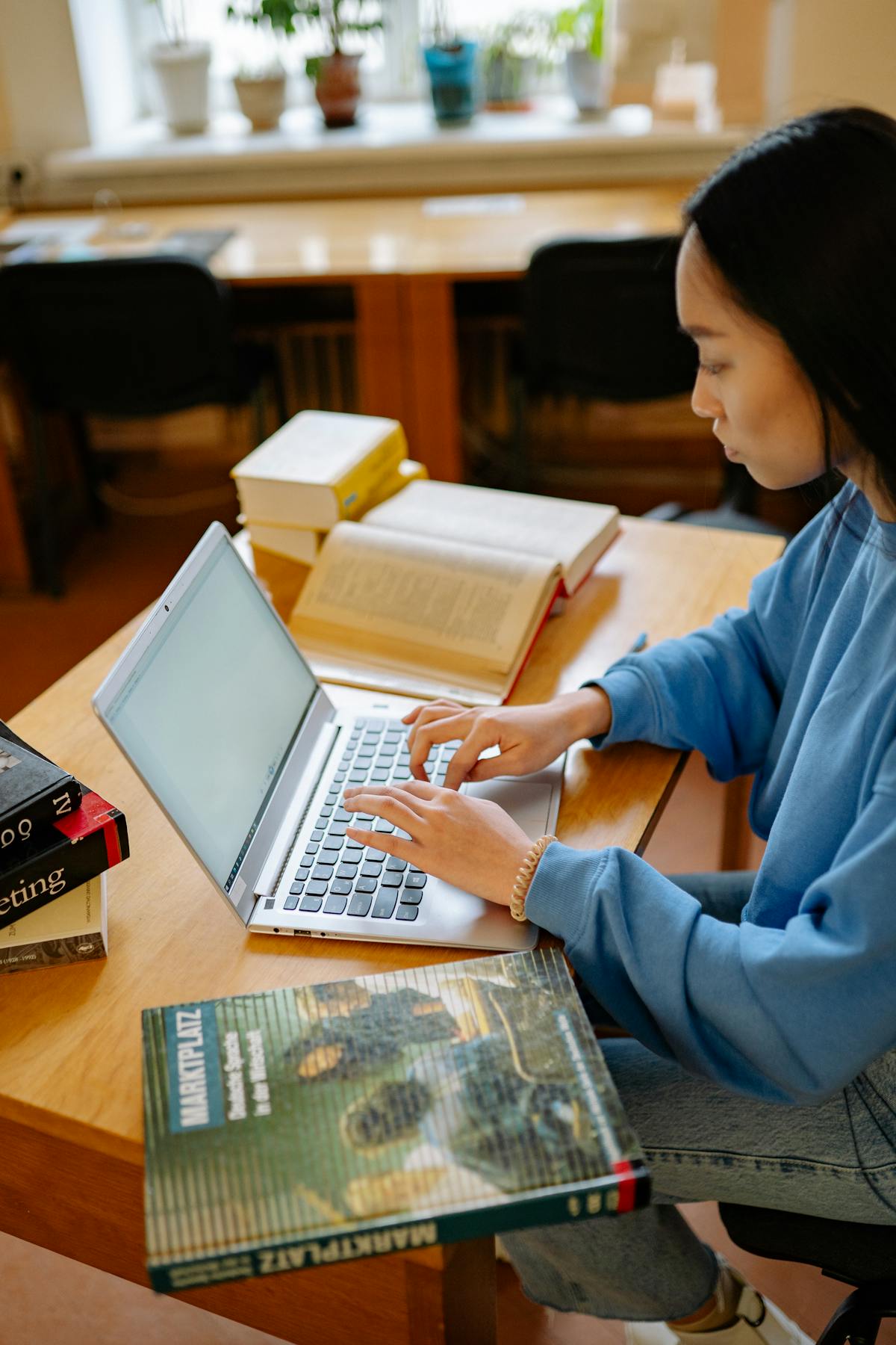 Student researching online in a quiet study space